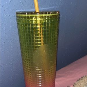Yellow and pink Starbucks cup